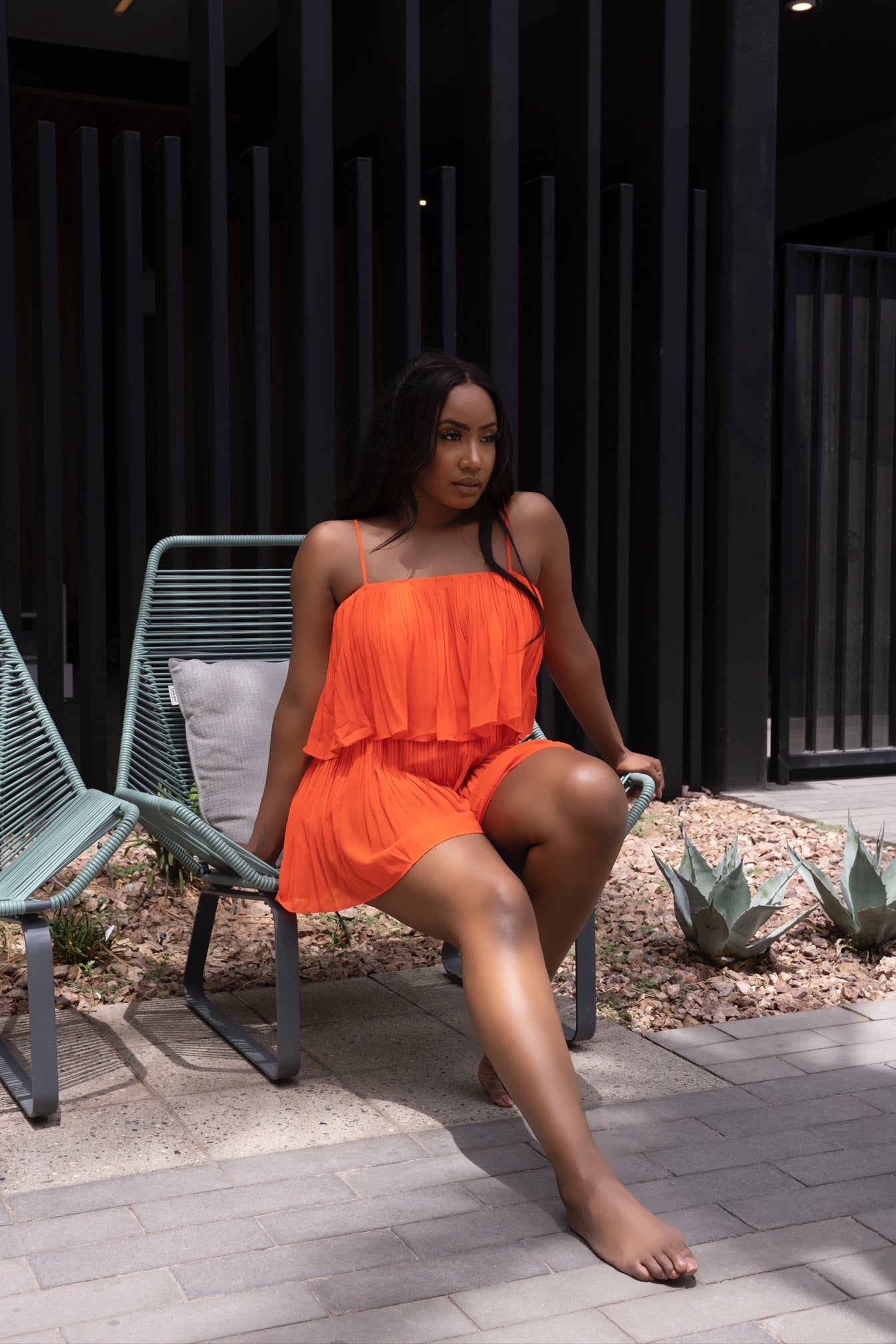 A DAY IN POSITANO PLEATED ROMPER - NEON ORANGE