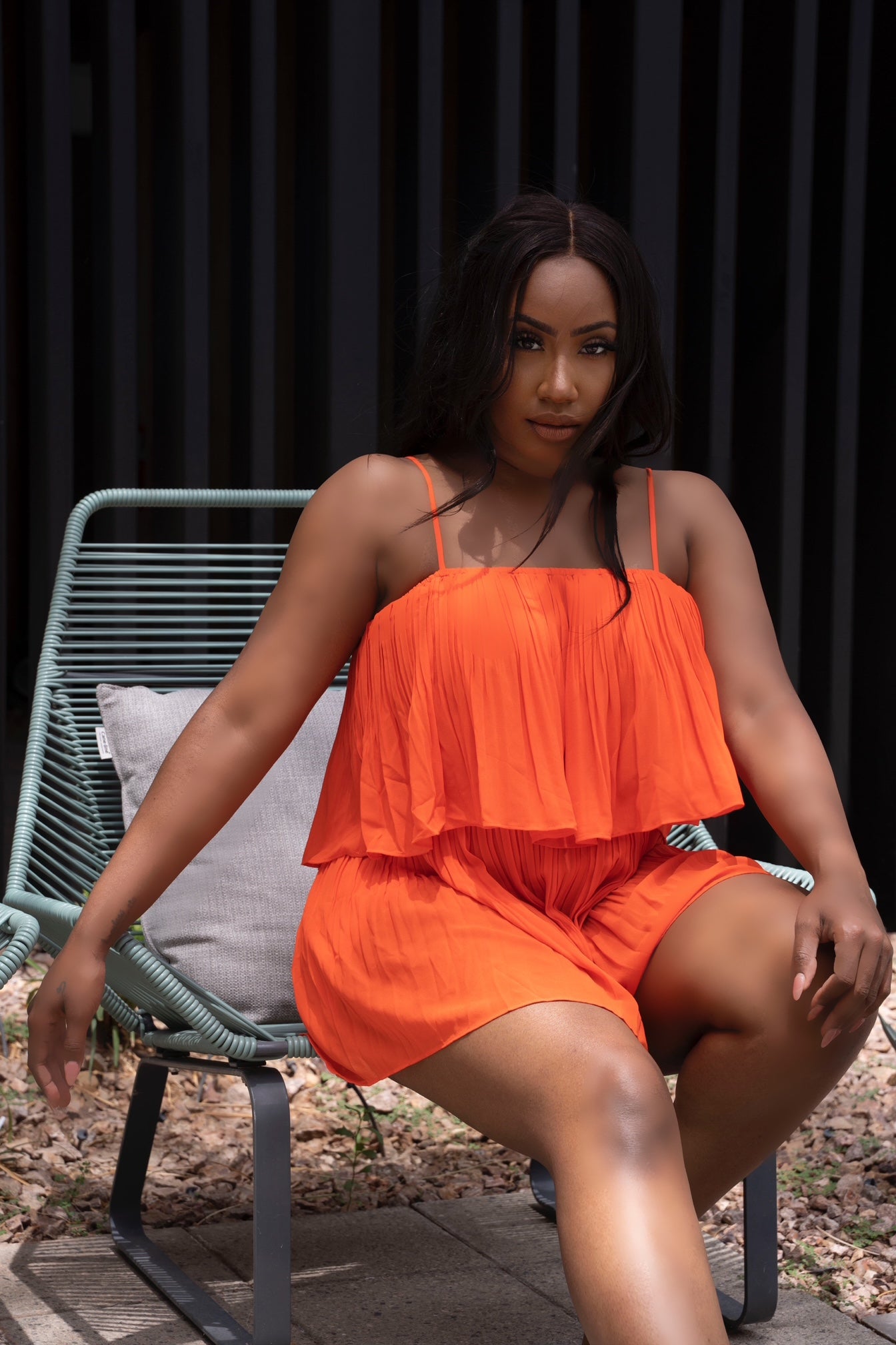 A DAY IN POSITANO PLEATED ROMPER - NEON ORANGE