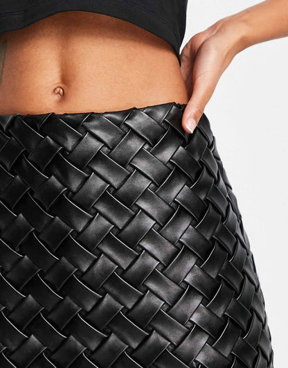 ALL CROSSED UP LEATHER WOVEN MINI SKIRT